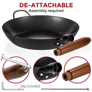 Black wok with detachable handle, key included for assembly on a white background