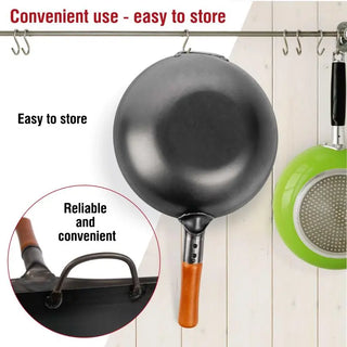Black frying pan with orange handle hanging on a rack, with text highlighting convenience and storage.