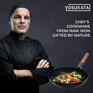 Chef holding a wok with food, wearing a black chef's coat against a dark background with 'Yosukata' branding.