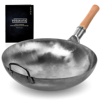 Wok with wooden handle and 'Yosukata' cookbook on a white background